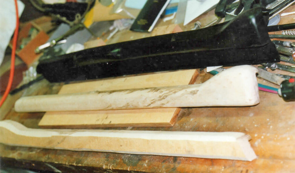 A pile of wood sitting on top of each other.