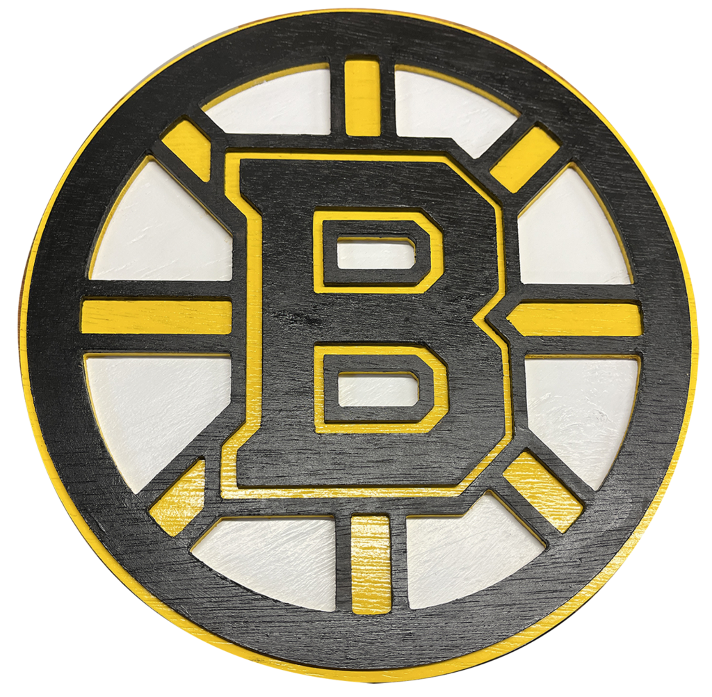 A wooden boston bruins logo on a black background.