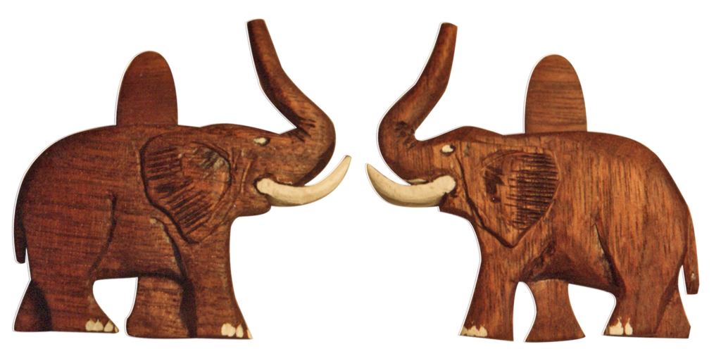 Two wooden elephants facing opposite directions with tusks.