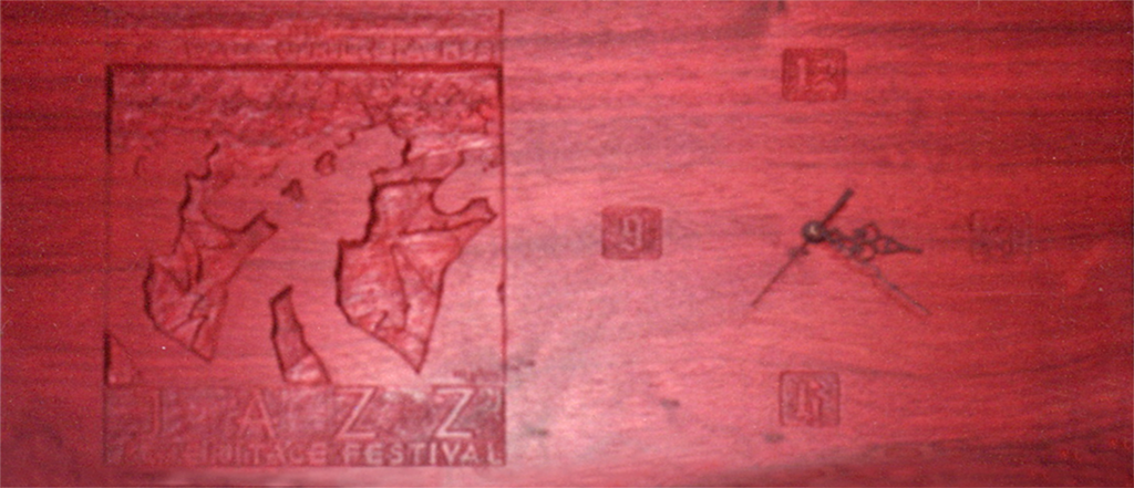 A close up of the stamp on a wooden box