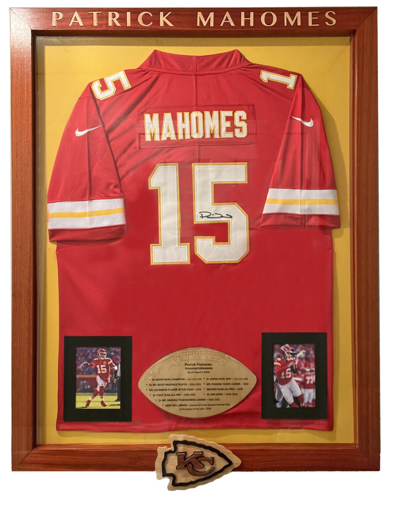 A framed jersey with the name and number of patrick mahomes.