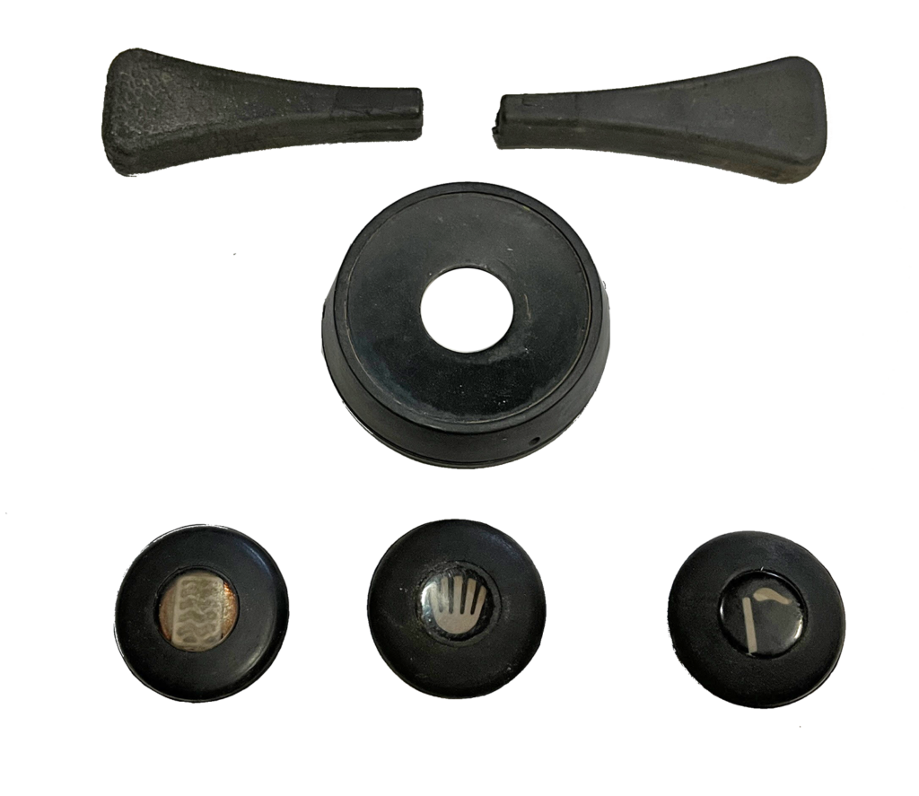A black object is shown with different shapes.
